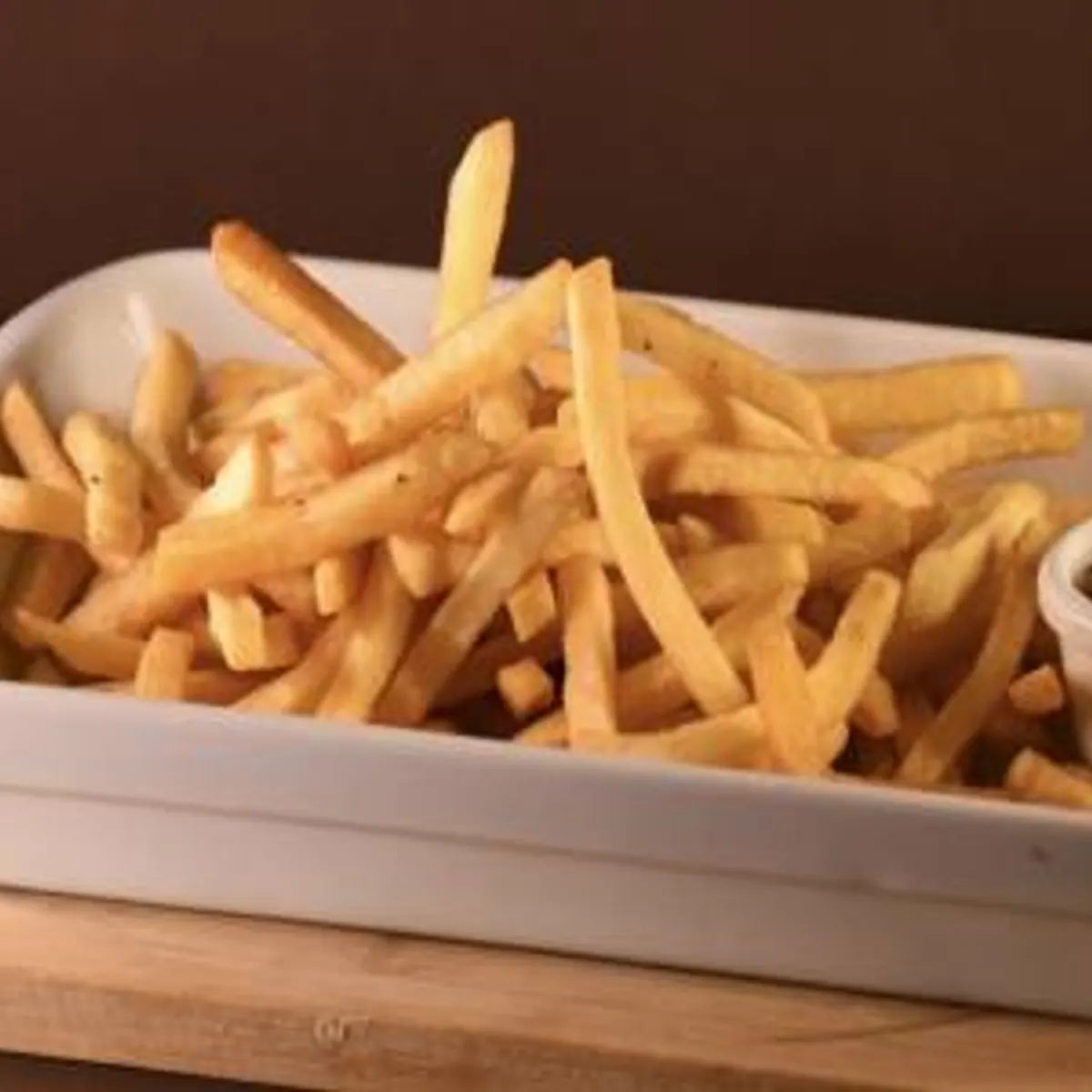 Foto de Fritas com Molho Cheddar e Bacon